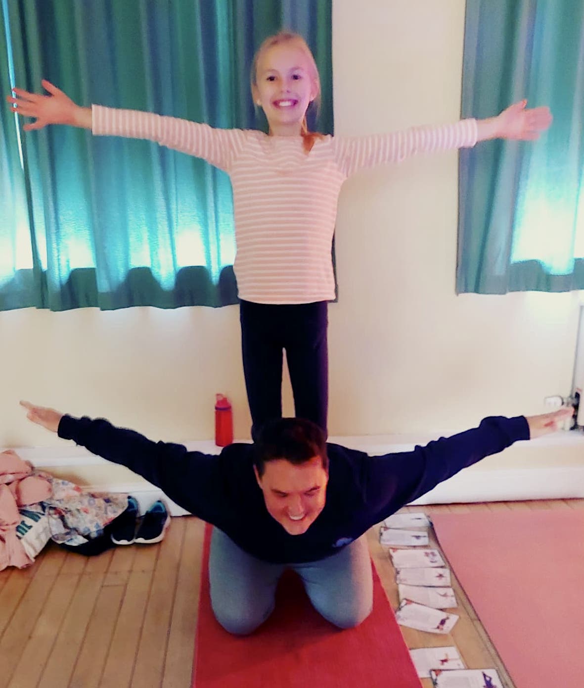 Dad and daughter family yoga